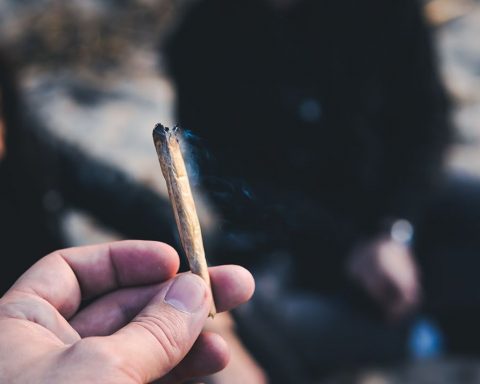 Man offering a cannabis joint